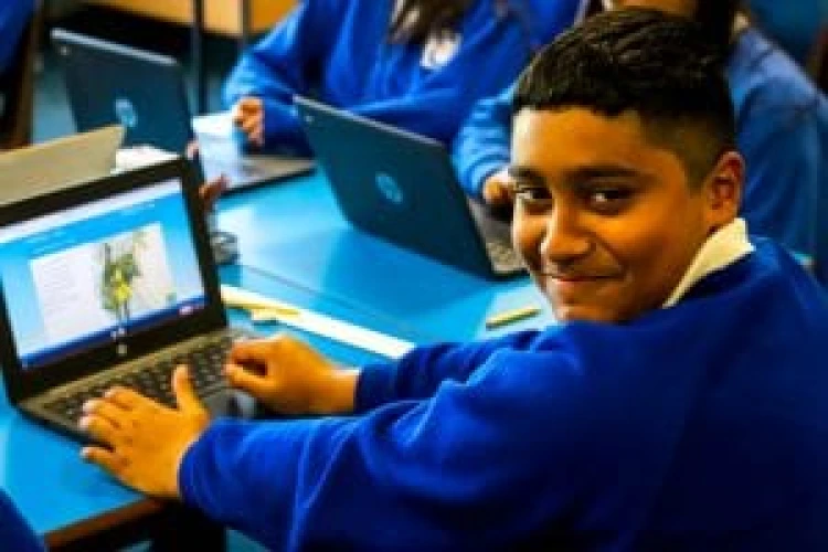 Pupil using a laptop