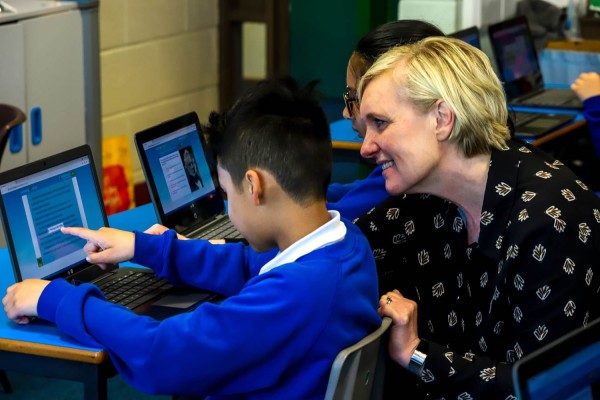 Teacher supporting student - guided window