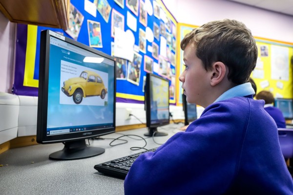 Child viewing a computer