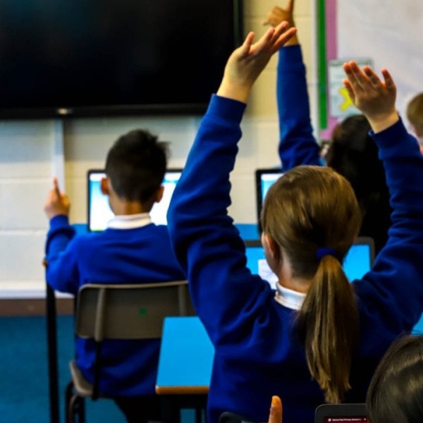 Pupils on a laptop in class