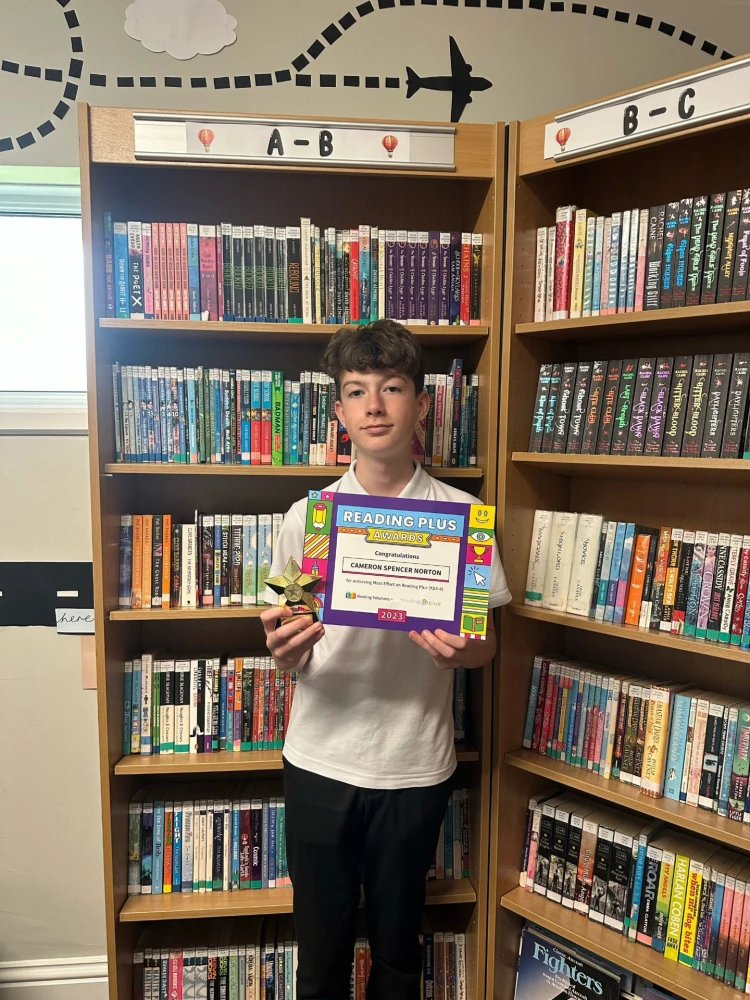 Student celebrating award