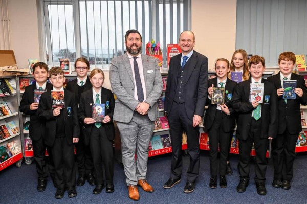 Teachers and students standing